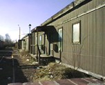 housing replaces boxcar abodes
railroad cars welded side-by-side